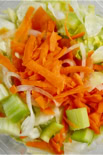 Fresh salad with carrots, celery and tomatoes